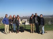 Eric Boole ’13, Amy Soenksen ’13, Amy Marchesi ’13, Ellie Fausold ’13, Nick Solano ’14, Cam Waugh ’13, and Kevin Prior ’13 stand by the grave of Pierre L’Enfant overlooking Washington, D.C.